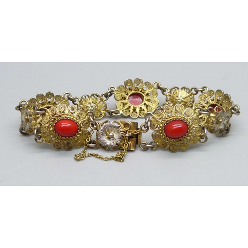 1139 - An .800 silver gilt bracelet set with coral, 15.5g,