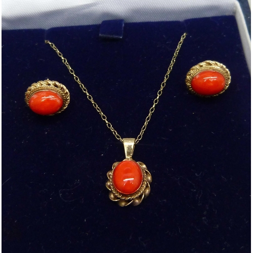 1141 - A 9ct gold and coral pendant with rope design border, with matching earrings, 1.9cm pendant drop, 6.... 