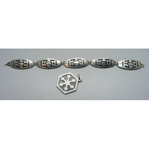 1150 - A Jorgen Jensen Danish pewter pendant, no.181 and panel bracelet, no.170A, 19cm