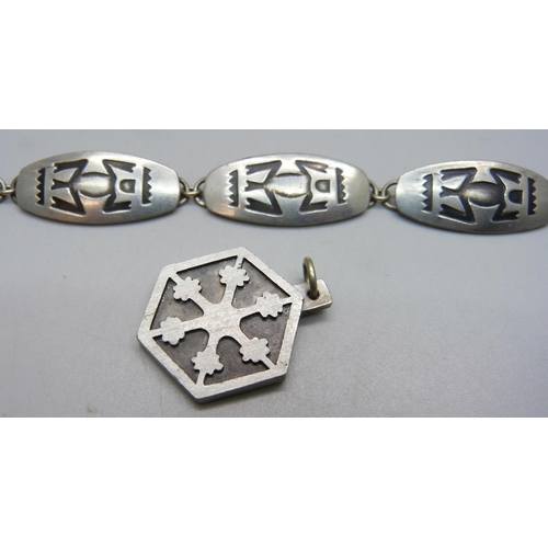 1150 - A Jorgen Jensen Danish pewter pendant, no.181 and panel bracelet, no.170A, 19cm