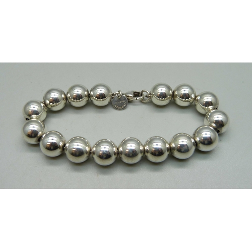 1152 - A Tiffany & Co. sterling silver ball bracelet, 17g, 17.5cm, abrasion to one bead