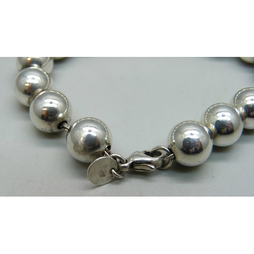 1152 - A Tiffany & Co. sterling silver ball bracelet, 17g, 17.5cm, abrasion to one bead