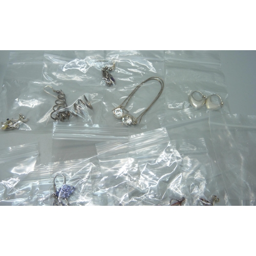 1161 - Seventeen pairs of silver earrings, a large pair of silver plated earrings and two other plated pair... 