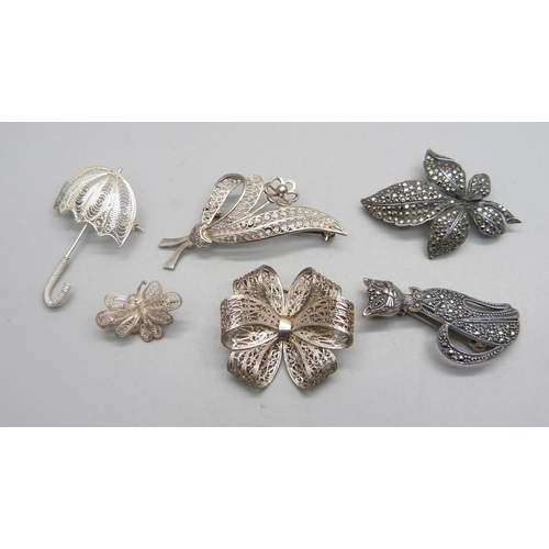 990 - Six white metal and silver brooches - marcasite set brooches both marked as silver, one filigree bro... 