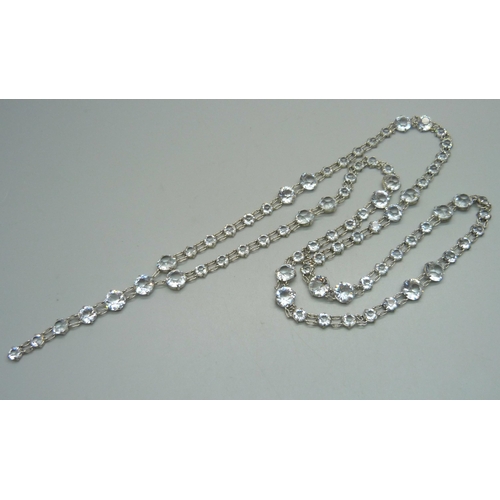 994 - An antique white metal paste set riviere necklace, extra long length, unmarked but tests as silver, ... 