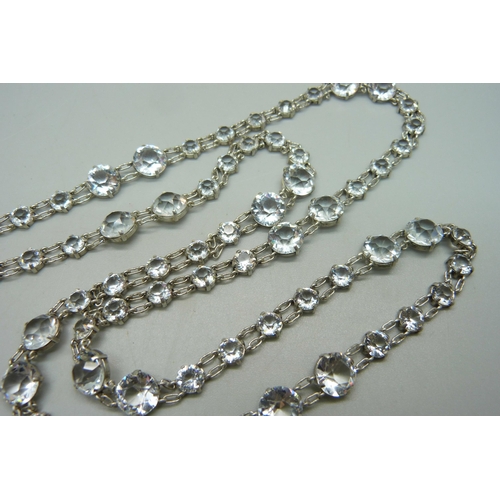 994 - An antique white metal paste set riviere necklace, extra long length, unmarked but tests as silver, ... 