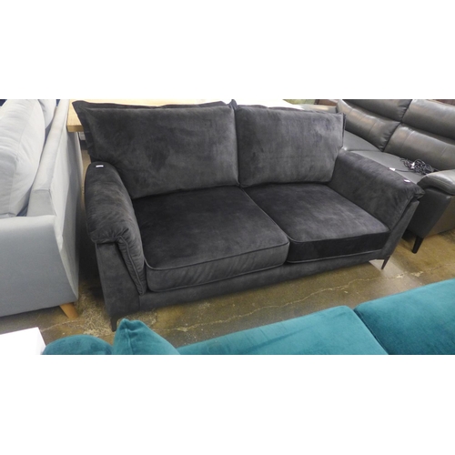 1473 - A Kingsley black shark skin effect three seater sofa on metal legs