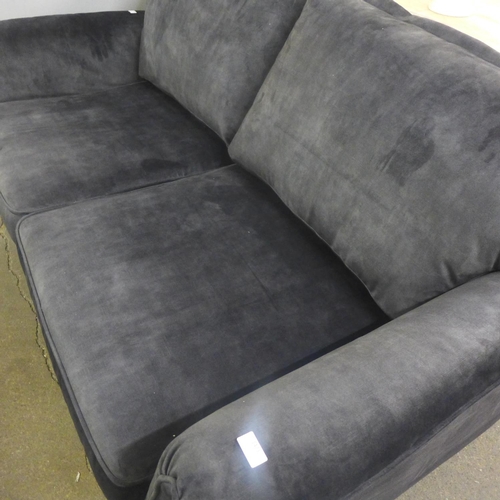 1473 - A Kingsley black shark skin effect three seater sofa on metal legs