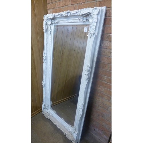 1487 - A large white ornate framed mirror