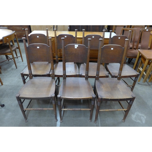 100 - A set of seven Liberty & Co. oak and elm chairs, designed by William Birch