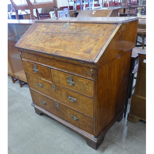 104 - A Queen Anne figured walnut bureau