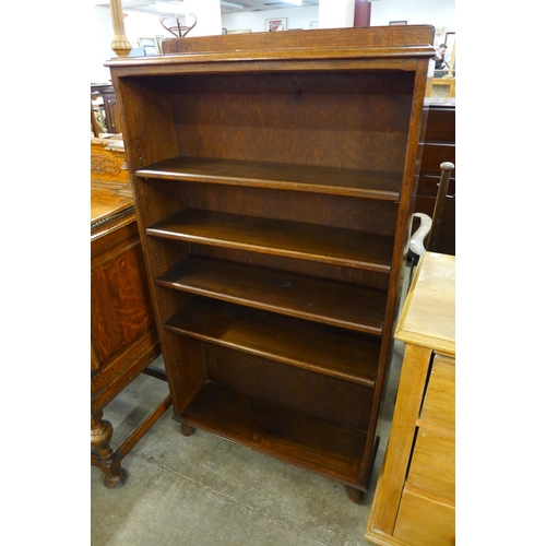 110 - A tall early 20th Century oak open bookcase