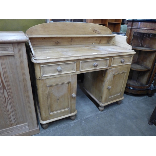 116 - A Victorian style pine desk