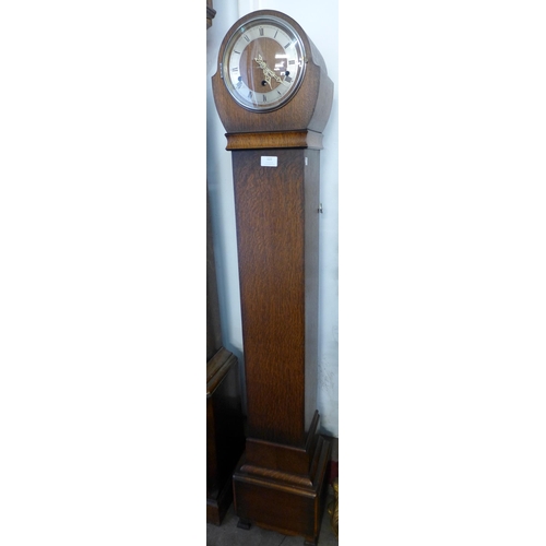 122 - An oak dwarf longcase clock