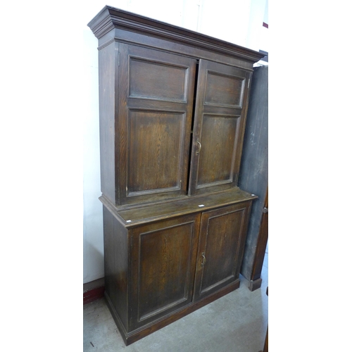 124 - A Victorian ash four door housekeepers cupboard