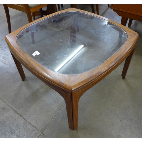 13 - A G-Plan teak and glass topped coffee table