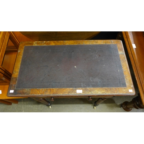 130 - A Victorian mahogany single drawer writing table