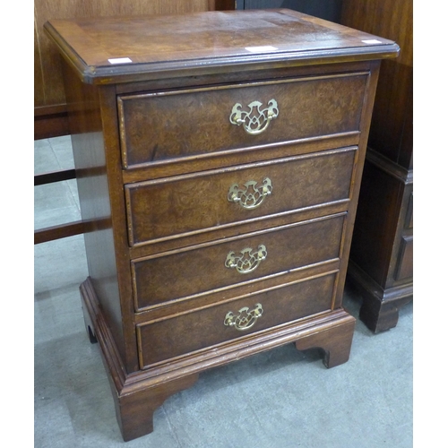 147 - A small George I style burr walnut chest of drawers