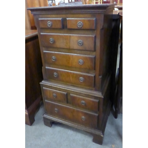 148 - A small George III style mahogany chest of drawers