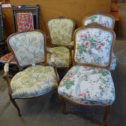 156 - A pair of French carved walnut and fabric upholstered fauteuil chairs and another pair of similar ch... 