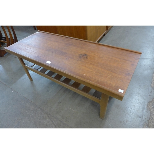 16 - A teak rectangular coffee table