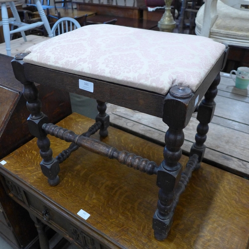 161 - A 17th Century style oak stool