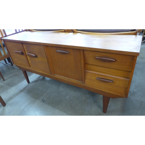 17 - A teak sideboard