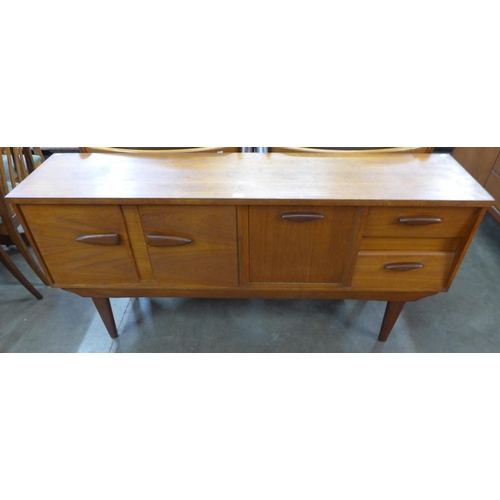 17 - A teak sideboard