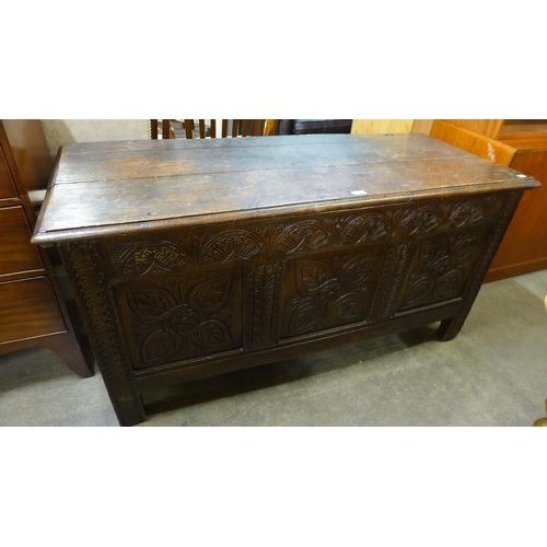 176 - A Charles II carved oak coffer