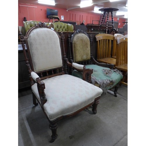 178 - A pair of Victorian lady's and gentleman's carved walnut armchairs