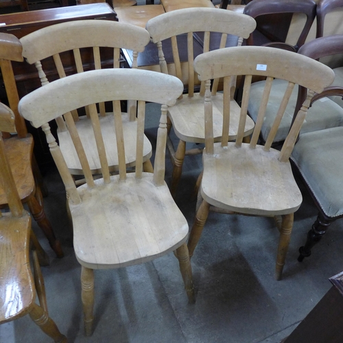 180 - A set of four Victorian style beech kitchen chairs