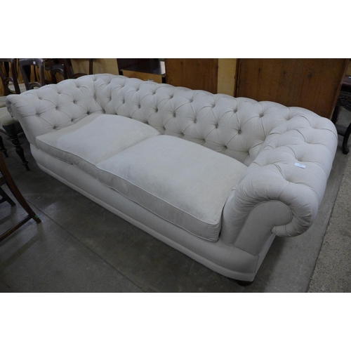 182 - A Victorian style fabric upholstered Chesterfield settee