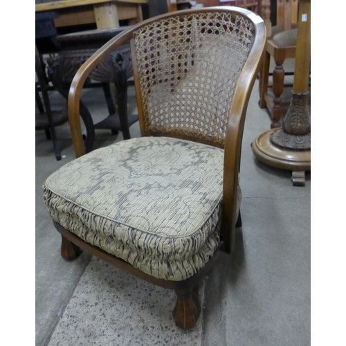 183 - An Art Deco beech bergere fireside chair