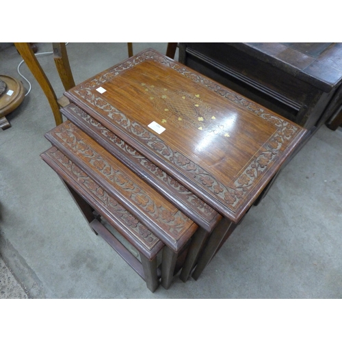 184 - An eastern brass inlaid hardwood nest of tables