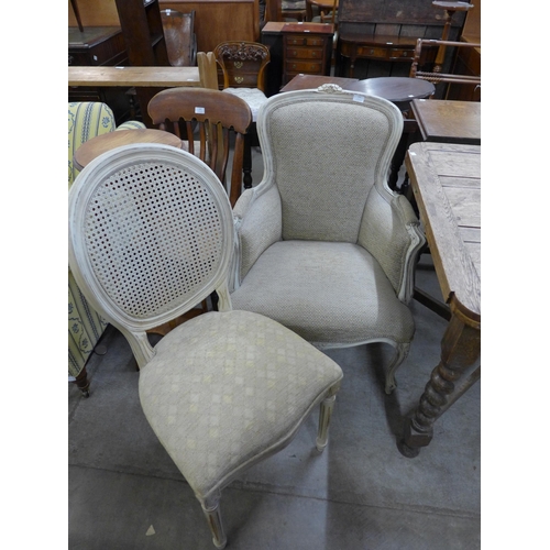 192 - Two French Louis XV style cream and fabric upholstered chairs