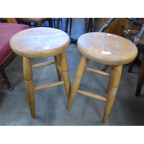 198 - A pair of beech kitchen stools