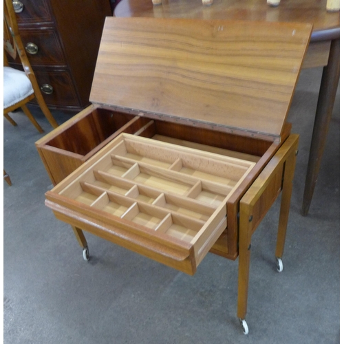 22 - A Danish teak sewing table