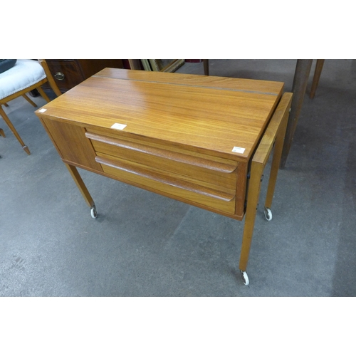 22 - A Danish teak sewing table