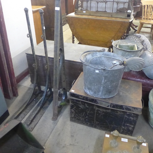 267 - Two tin deed boxes, a metal bucket, a lamp and three metal wall hanging brackets