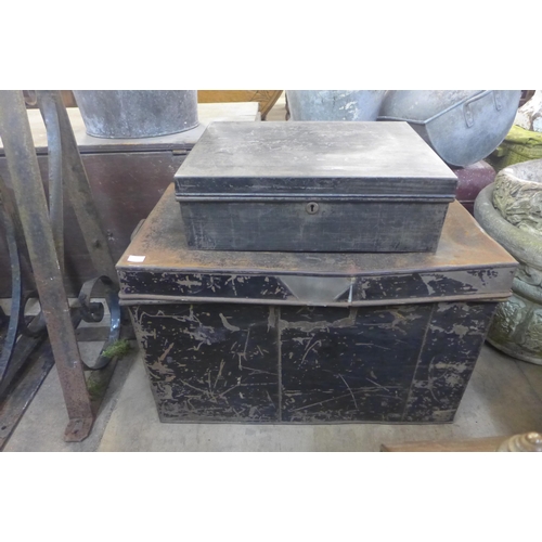 267 - Two tin deed boxes, a metal bucket, a lamp and three metal wall hanging brackets