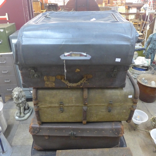 275 - Six vintage leather, metal and wooden trunks, including a 1950s suit carrier