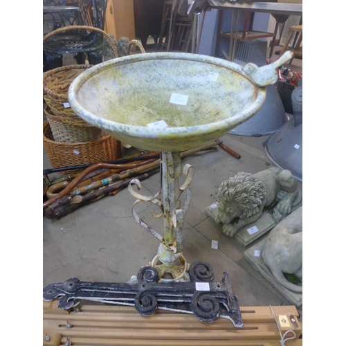 287 - A small aluminium bird bath, an artist's easel and four steel door brackets