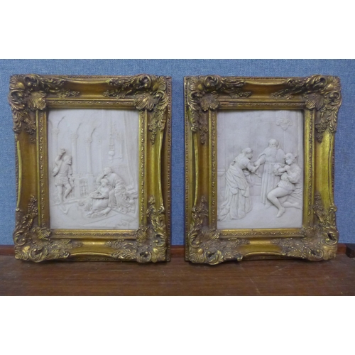 325 - A pair of classical style faux marble plaques, framed