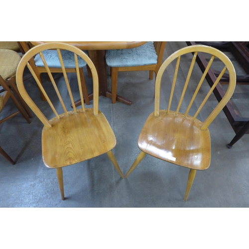 35 - A pair of Ercol Blonde elm and beech Windsor chairs