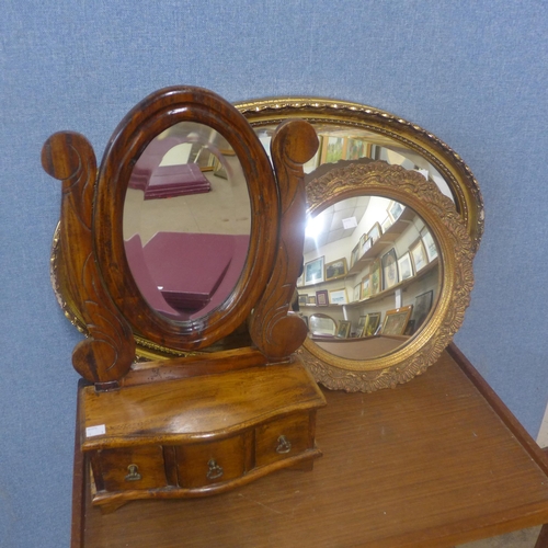 360 - A Victorian style hardwood toilet mirror and two gilt framed mirrors