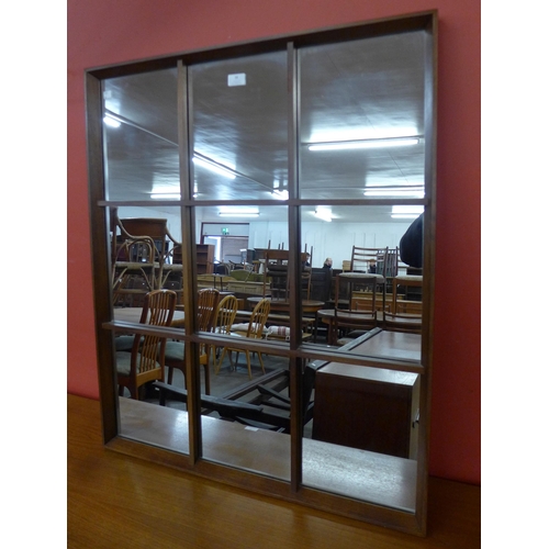 38 - A teak framed mirror