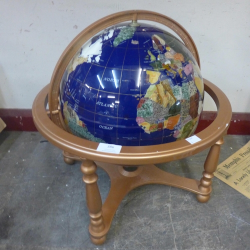 386 - A semi-precious gemstone set terrestrial globe on coated brass stand