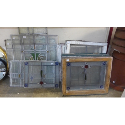 395 - Assorted stained glass windows and window panes