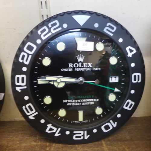 397 - A Rolex style dealer's display wall clock