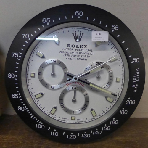 400 - A Rolex style dealers circular wall clock